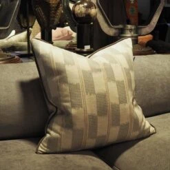 Positano Sand Cushion -Andrew Martin 141081 positano grey lifesytle 1