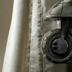 Vibe Silver Fabric -Andrew Martin 216565 vibe silver fabric trimmed in feather guinea trim