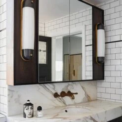 Selecta Wall Light -Andrew Martin 340413 selecta long sconce in bronze and hand rubbed antique brass life 1