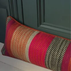 Llama Orange Draught Excluder Cushion -Andrew Martin 352672 llama orange draught excluder wool lifestyle sml