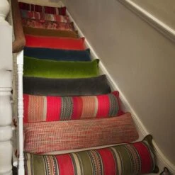 Medici Charcoal Draught Excluder Cushion -Andrew Martin 352990 draught excluder stair group shot sml